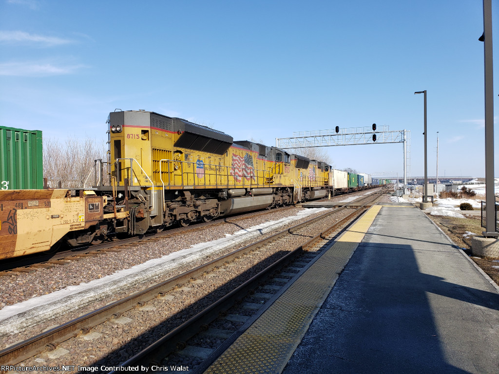 UP 8715 trailing and serving as a mid train helper on this east bound